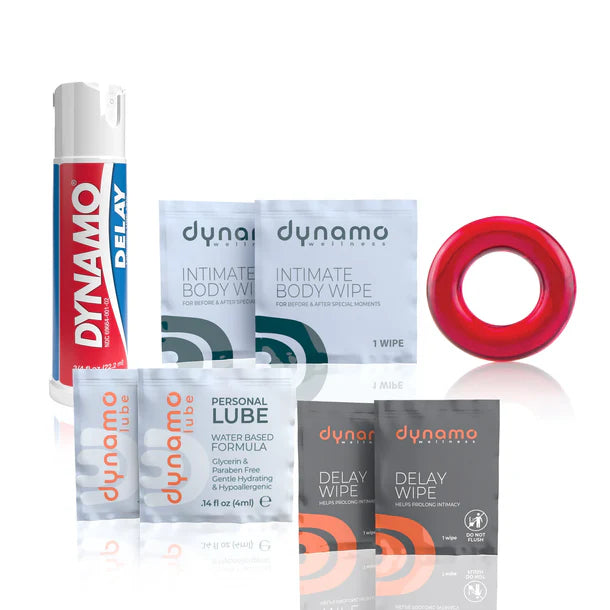 Collection of Dynamo personal care products including a tube, packets, and a red ring on a white background.