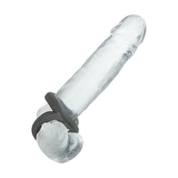 A clear silicone adult novelty product with a dark gray ring and textured base, shown on a plain white background.
