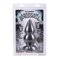 Metallic butt plug in packaging with 'Doc Johnson' branding on a white background
