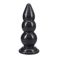 Black three-tiered  on a white background anal plug