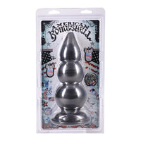 Metallic butt plug in packaging with 'American Bombshell' branding.