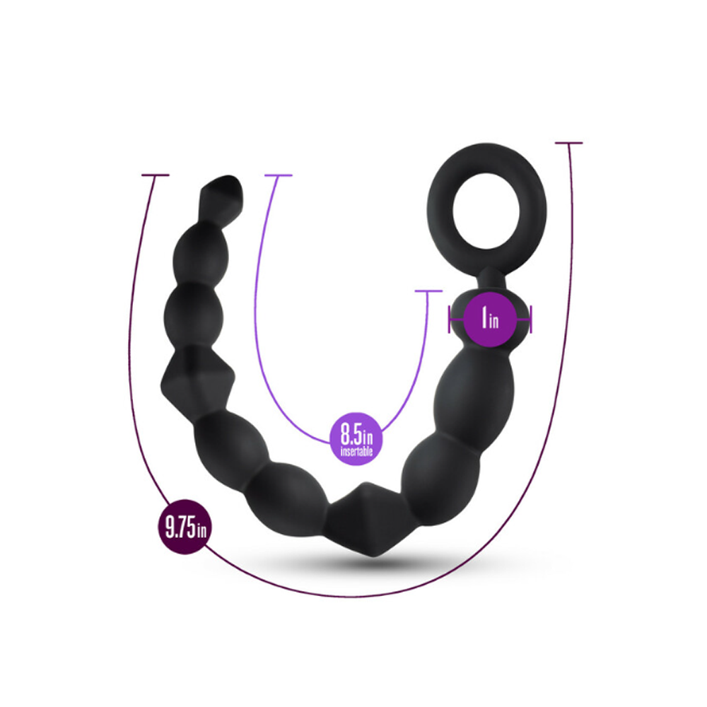 Black silicone ring with measurements on a white background