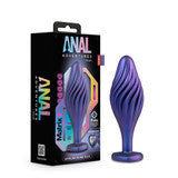 iridescent purple tapered, swirl anal plug next to the product display box