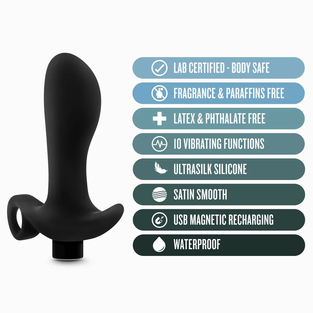 curved anal plug with finger loop beside specs