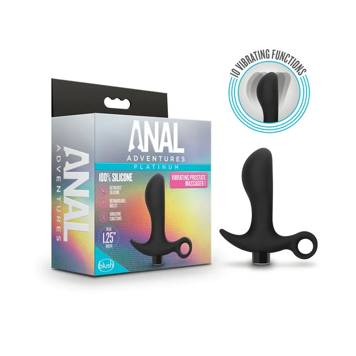black anal plug with finger loop beside box packaging