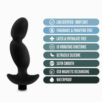 black curved anal plug beside specs