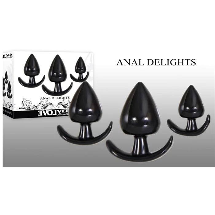 set of 3 black tapered anal plugs of different sizes with curved bases in front of white display box