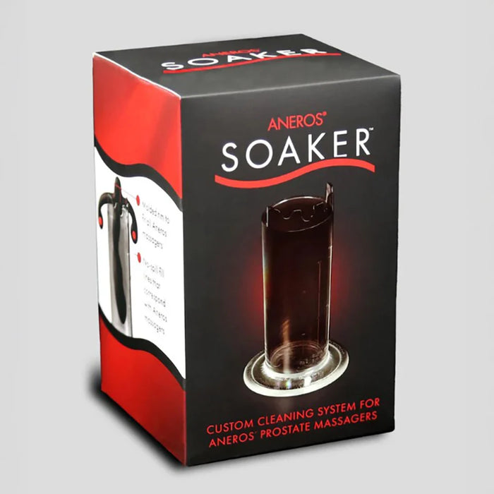 A retail box for the Aneros Soaker custom cleaning system, featuring a black and red design with a graphic of the glass massager on a light gray background.