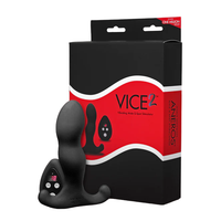 black anal butt plug with remote beside box packaging