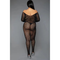 female wearing animal print black bodystocking back view