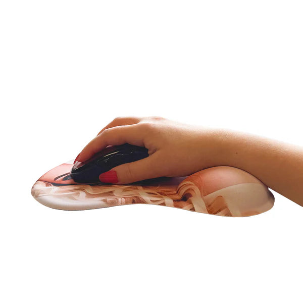 Hand using a computer mouse on a decorative mouse pad with a white background
