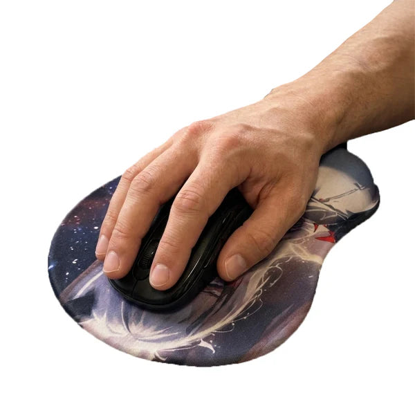 Hand using a computer mouse on a decorative mouse pad with a white background