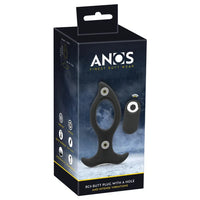 black vibrating butt plug with hole in middle, bottom base with remote control on box packaging