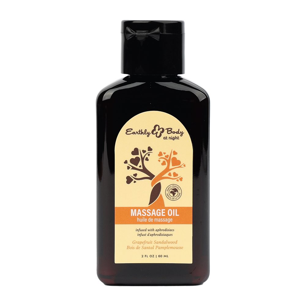 Black bottle of Earthly Body massage oil grapefruit sandalwood on a white background
