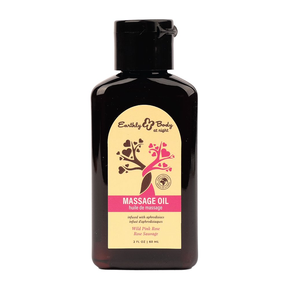 Massage oil bottle wild pink rose by earthly body with a black cap and yellow label on a white background
