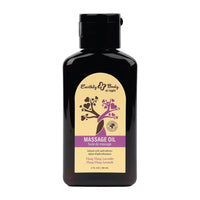 Black bottle of Earthly Body massage oil ylang ylang lavender on a white background