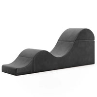 Black wedge-shaped chair on a white background