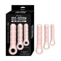beige anal training wands with packaging labeled 'ASS-SATION' on a white background