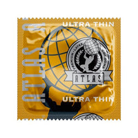 Yellow packaging of Atlas ultra thin condoms with brand logo.