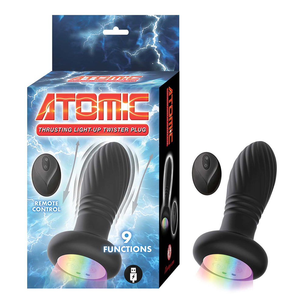 black thrusting anal butt plug with remote control beside box packaging