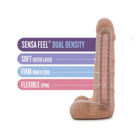 Sensa Feel dual density dildo with labeled layers on a white background