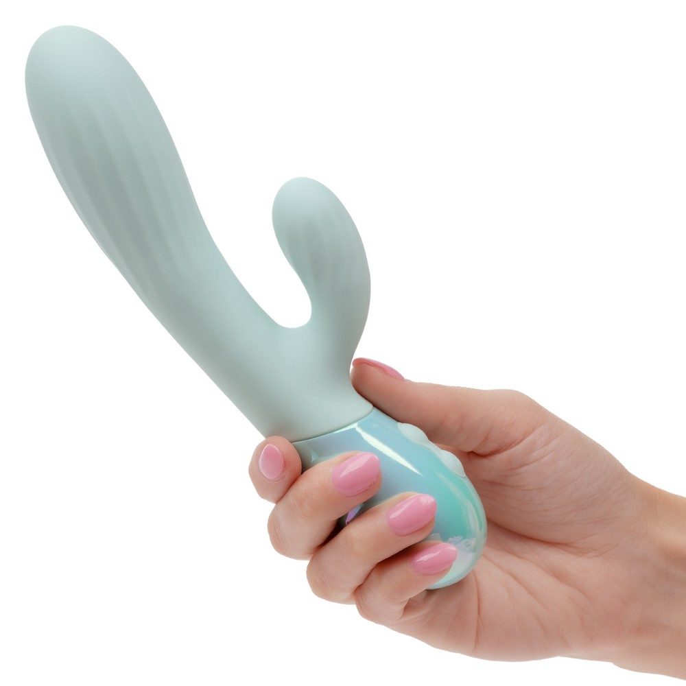 Light blue aura dual ripple vibrator held by a hand with pink nail polish on a white background