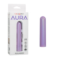 A purple curved vibrator shown next to its white retail packaging box, branded CaleXotics AURA.