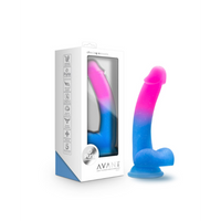 pink & blue dildo with balls beside packaging