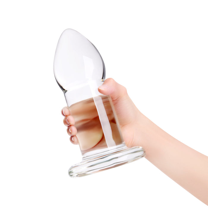 xl glass anal dilator plug held in hand