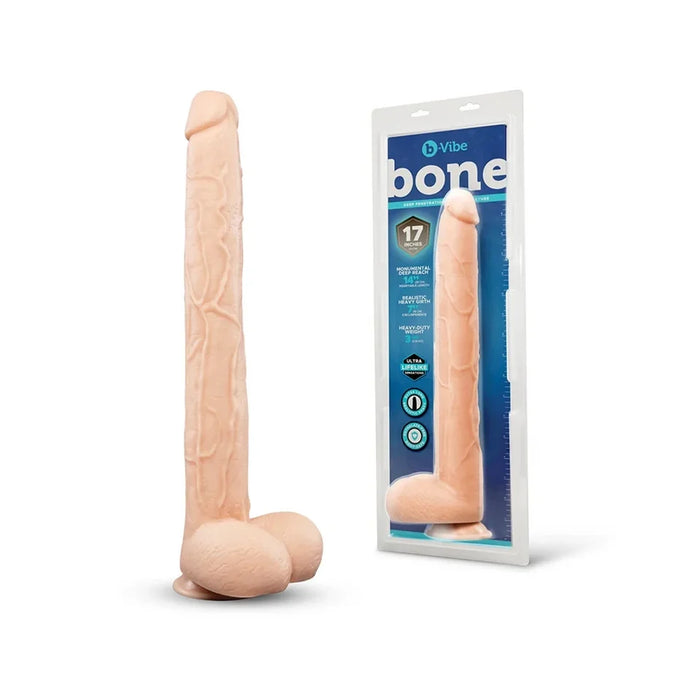 b-vibe bone 17" dildo with balls beside package