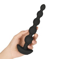 black anal beads held in hand