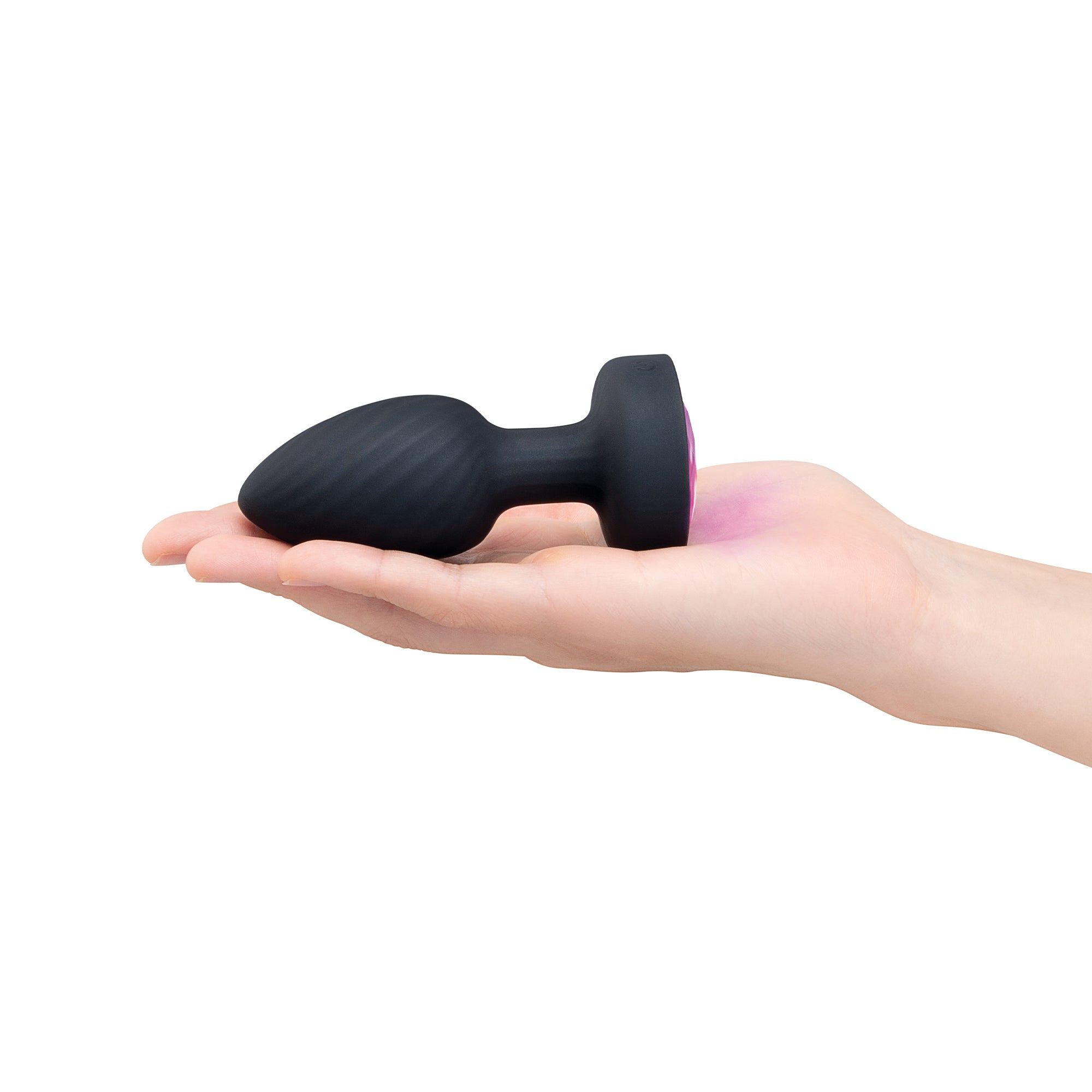 black anal plug held in hand