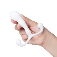 white curved p-spot anal plug held in hand