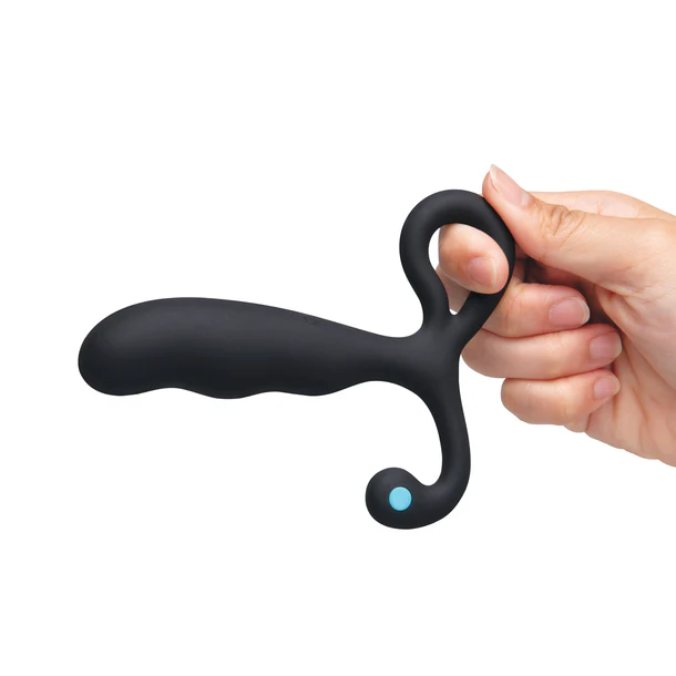 black curved anal plug with finger ring. held in hand