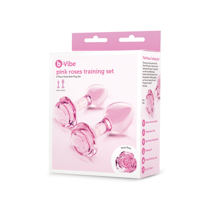 2 pink glass anal plug with rose shaped bottoms on box packaging