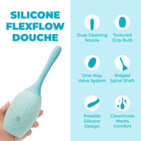 blue anal douche held in hand, with specs