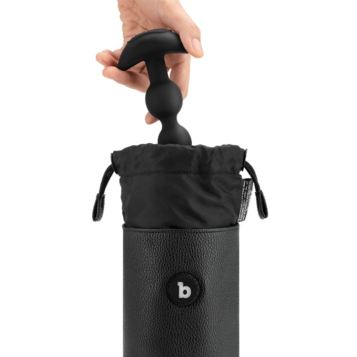 hand shown putting a toy into a uv light cleaning bag