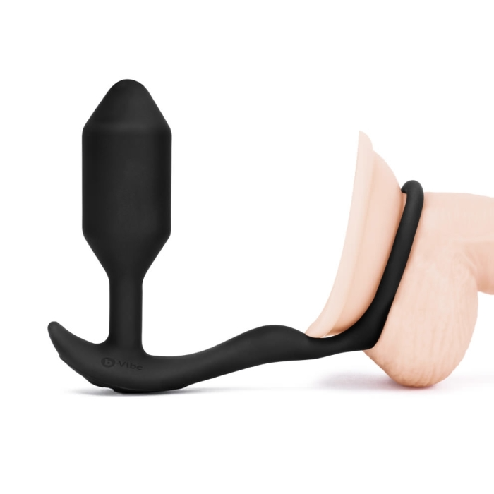 Black silicone butt plug on a white background
