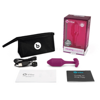 pink curved anal plug with box, case, charger and books