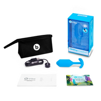 blue tapered anal plug with box, case, and accessories 