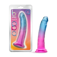 a blue and purple transparent penis shaped dildo with a suction cup shown next to its plastic packaging