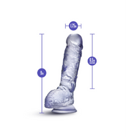 clear dildo with measurements on a white background