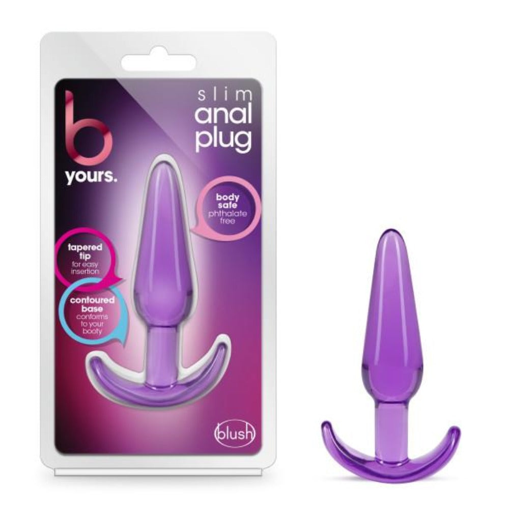 Purple anal plug with packaging on a white background