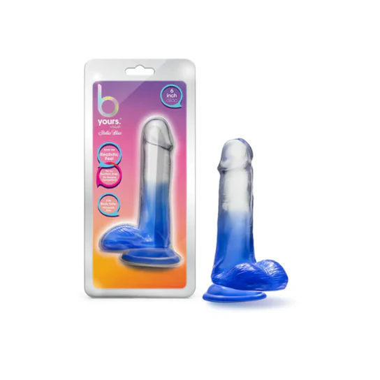 a blue to clear ombre penis shaped dildo with balls and a suction cup, shown next to its plastic packaging