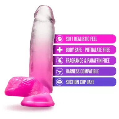 a pink to clear ombre penis shaped dildo with balls and a suction cup, shown next to its key features
