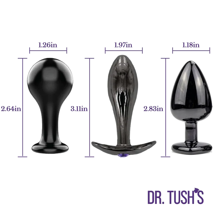 Dr. Tush’s Bad Decisions Collection metal anal plug size guide showing three plug shapes with height and width measurements.