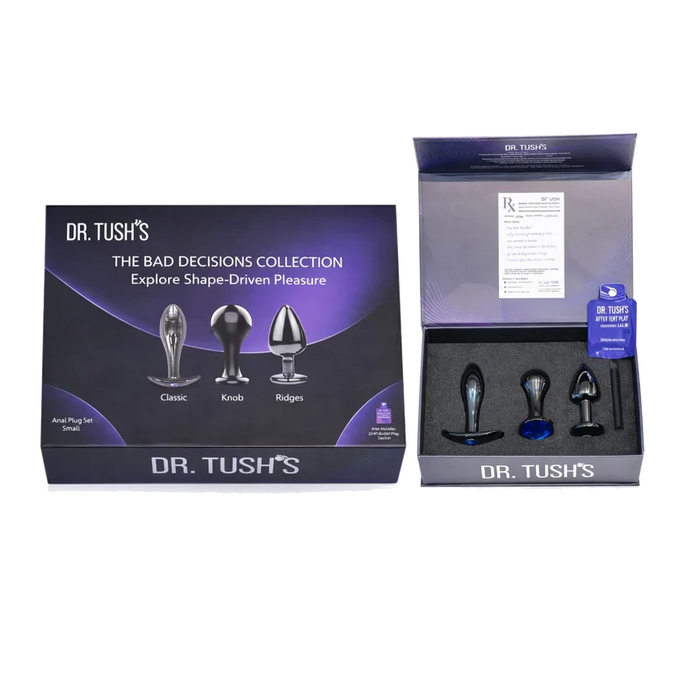 Dr. Tush’s Bad Decisions Collection featuring three metal anal plugs in Classic, Knob and Ridges shapes, presented in premium display packaging.