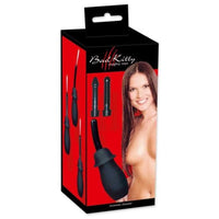 woman on box packaging, with black anal douche with attachments, on a white back ground