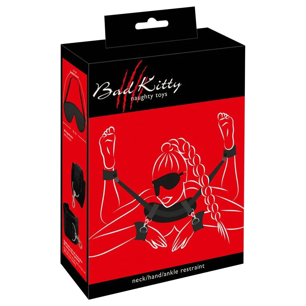 female silhouette laying on stomach, with ankle & wrist cuffs attached to neck support with blindfold on box packaging