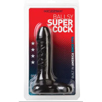 a black detailed penis shaped dildo with balls, shown in its plastic packaging